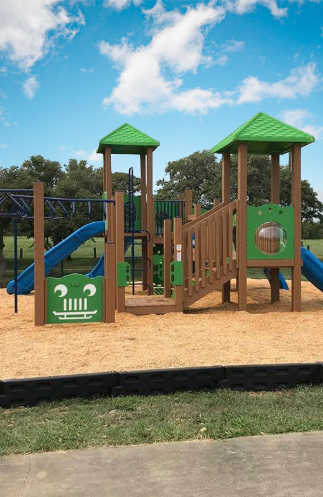 playground with equipment from Action Play Systems